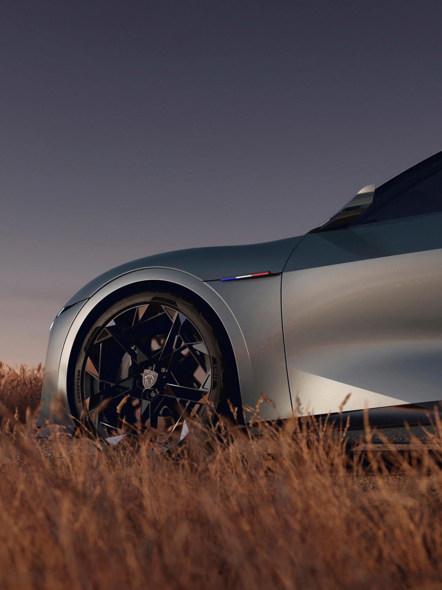 Detail van de PEUGEOT RCZ Vision met voorwiel, embleem en sculpturale lijnen